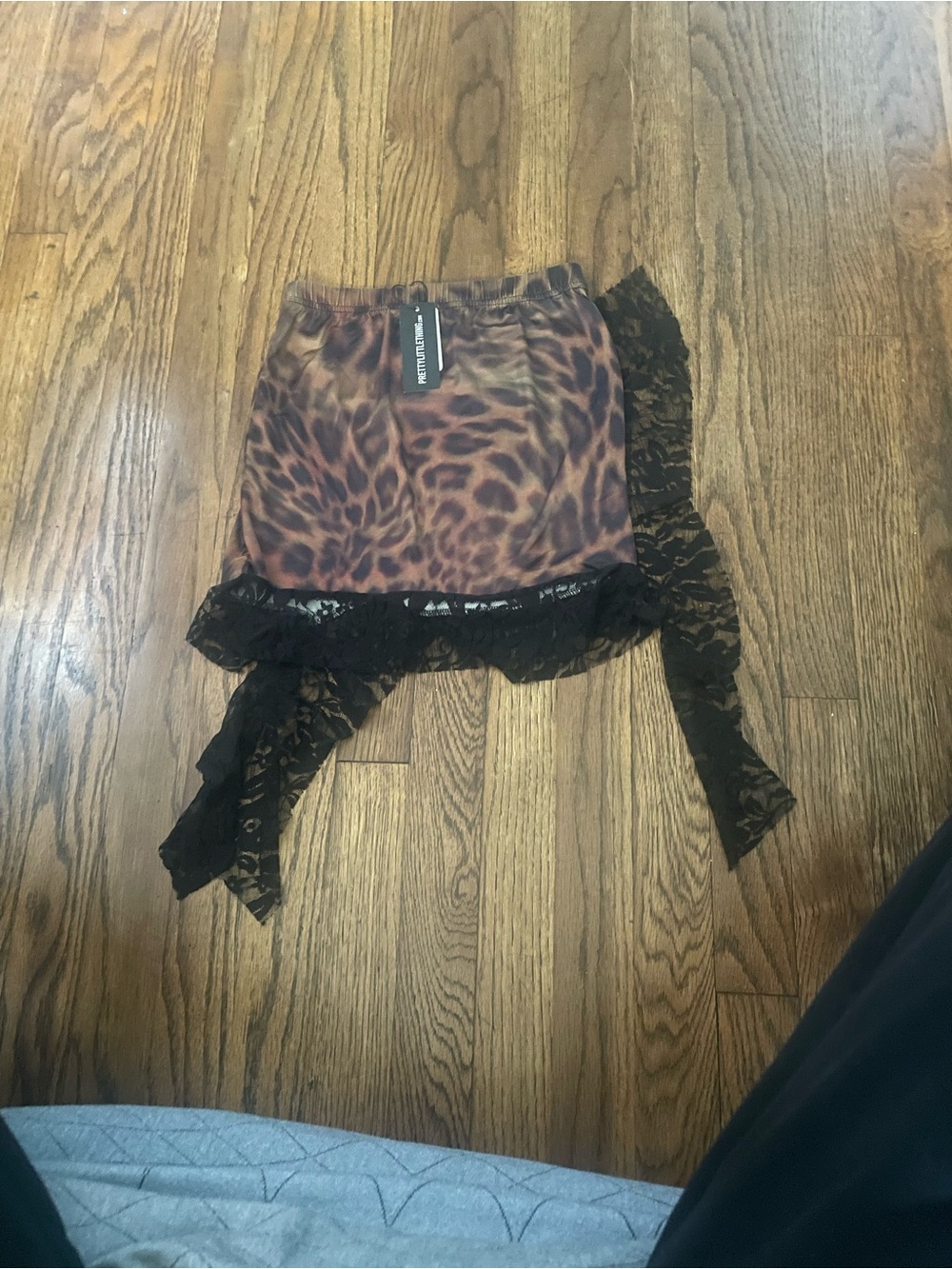 PrettyLittleThing Brown Leopard Print Mini Skirt with Black Lace Trim
